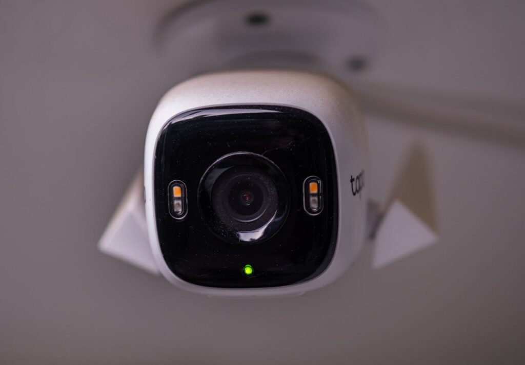 Detailed view of a modern security camera installed indoors in İzmir, Türkiye.